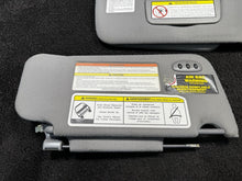 1997-2004 Nissan Pathfinder Dual Sun Visor Set Cloth Gray OEM