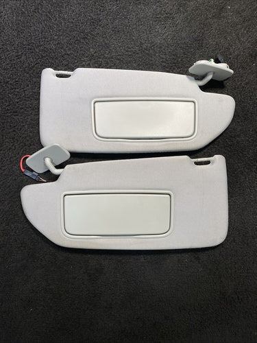 39874925 2003-2006 Volvo XC90 Sun Visors Gray W/ Homelink & Mirror Light Pair Set OEM
