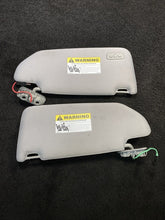 39874925 2003-2006 Volvo XC90 Sun Visors Gray W/ Homelink & Mirror Light Pair Set OEM
