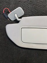 39874925 2003-2006 Volvo XC90 Sun Visors Gray W/ Homelink & Mirror Light Pair Set OEM