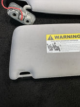 39874925 2003-2006 Volvo XC90 Sun Visors Gray W/ Homelink & Mirror Light Pair Set OEM