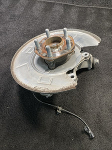 1044416-00-F 17-23 Tesla Model 3 Rear Right Knuckle Spindle Hub &Dust Shield OEM 1044416-00-F