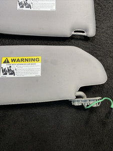 39874925 2003-2006 Volvo XC90 Sun Visors Gray W/ Homelink & Mirror Light Pair Set OEM