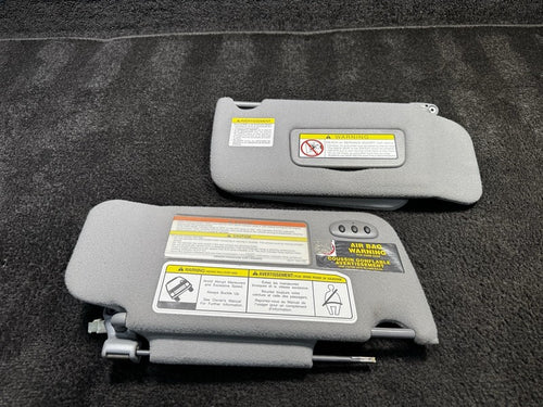 1997-2004 Nissan Pathfinder Dual Sun Visor Set Cloth Gray OEM