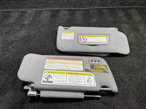 1997-2004 Nissan Pathfinder Dual Sun Visor Set Cloth Gray OEM
