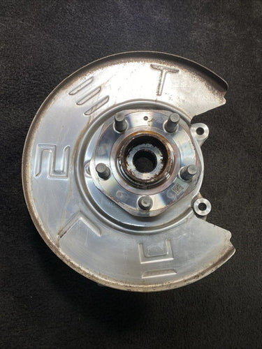 1044411-00-F 17-23 Tesla Model 3 Rear Left Knuckle Spindle Hub & Dust Shield OEM 1044411-00-F